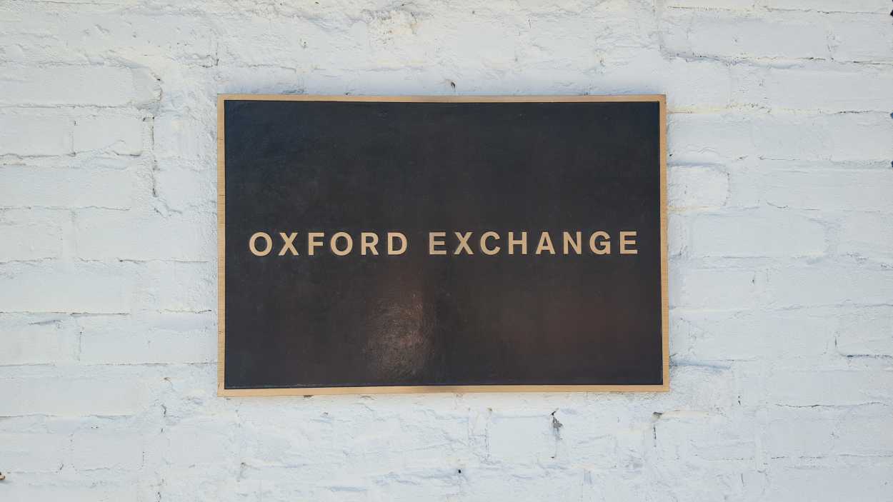 A sign reads "Oxford Exchange"