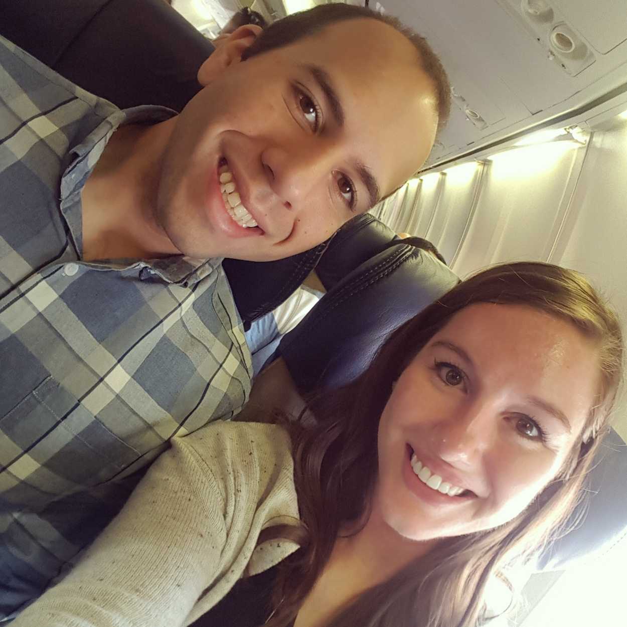 A selfie of Alyssa and Michael on a plane