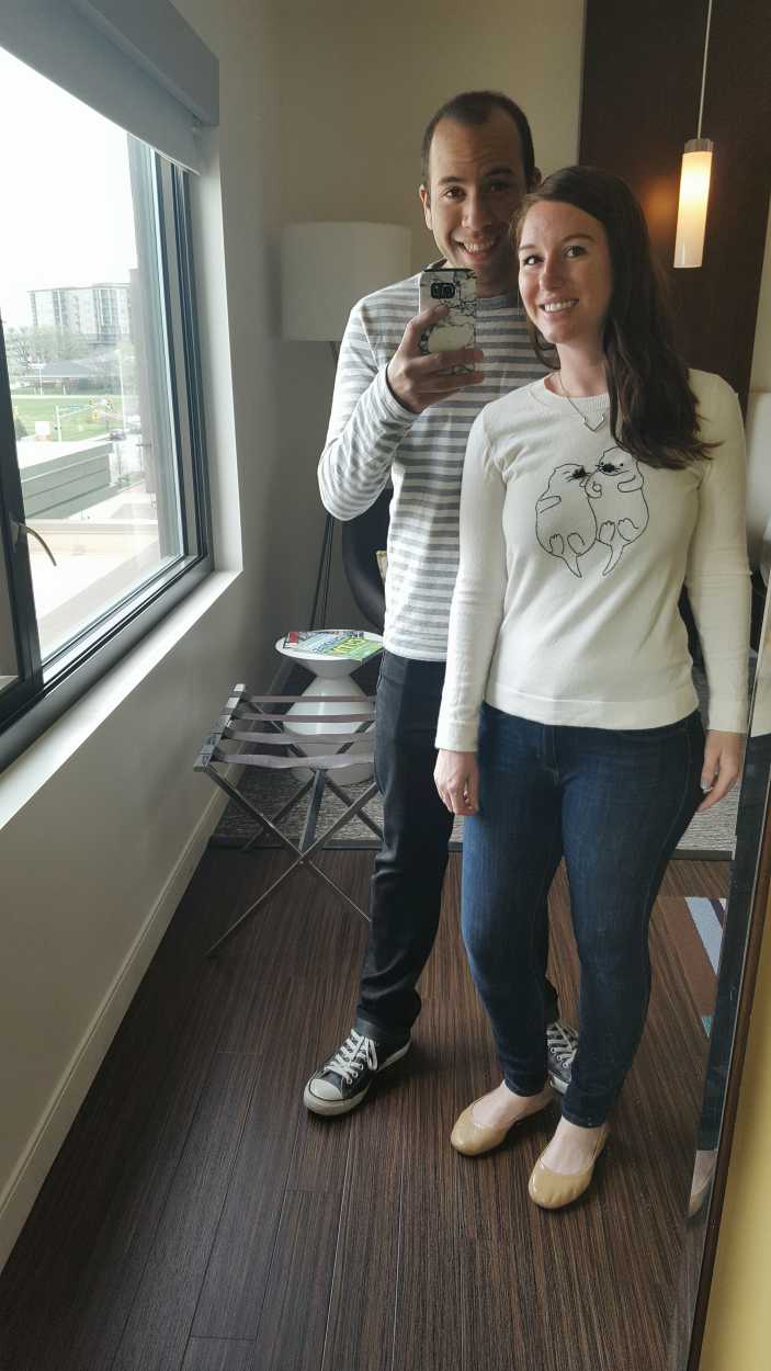 Alyssa and Michael take a photo in the hotel mirror