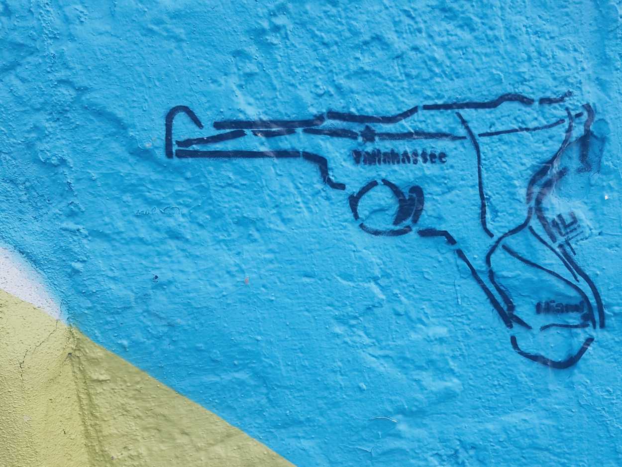 A graffiti painting of Florida in the shape of a gun