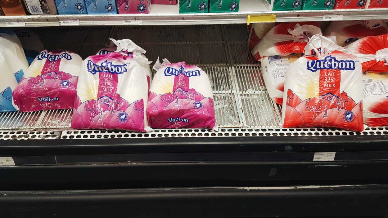 bags of milk in the grocery store