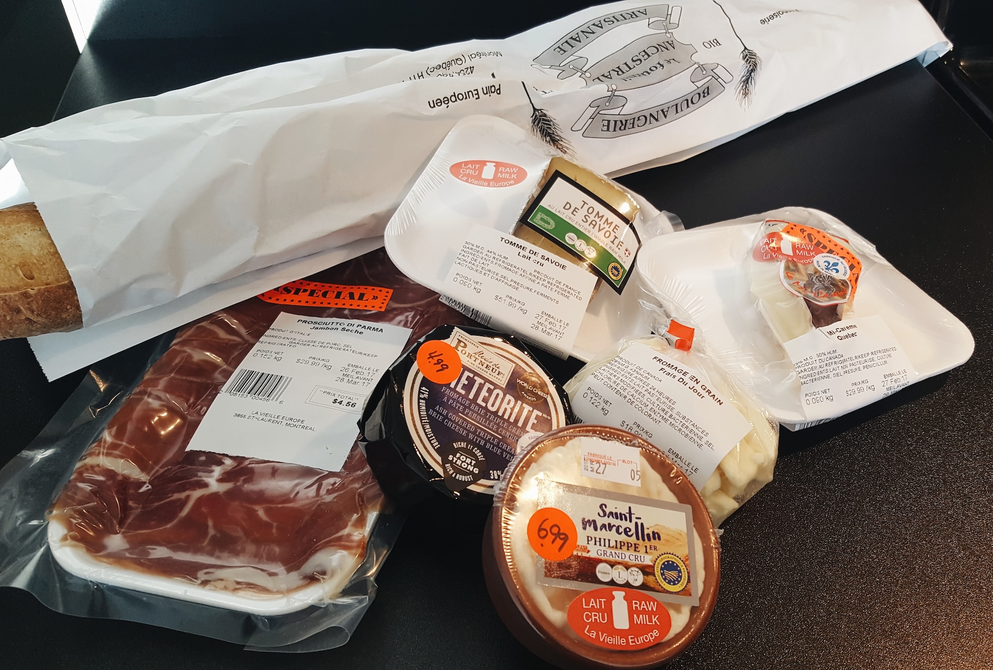 purchases made at a grocery store in Montreal, including bread, meat, and cheese