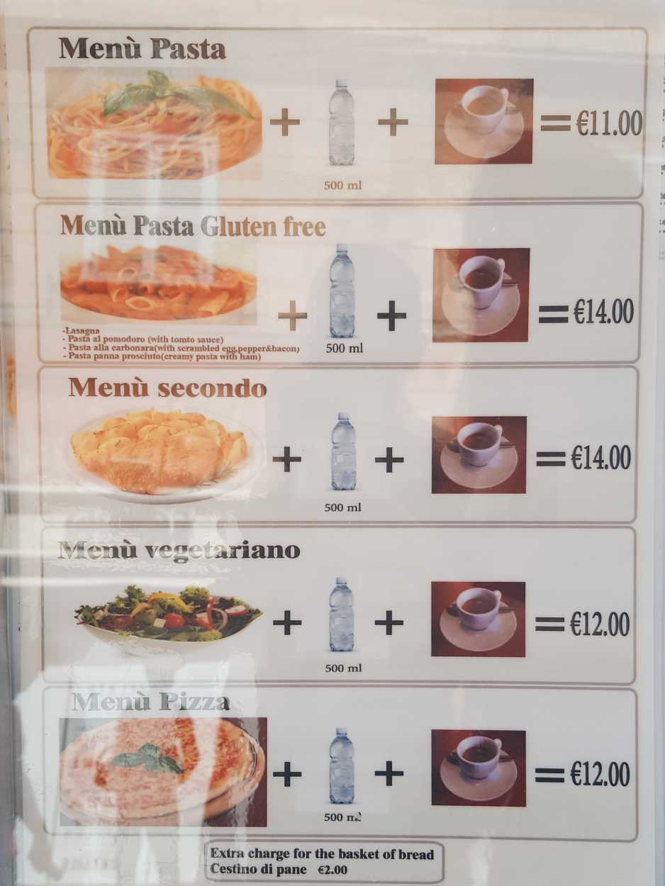 A menu with pictures of the food and prices