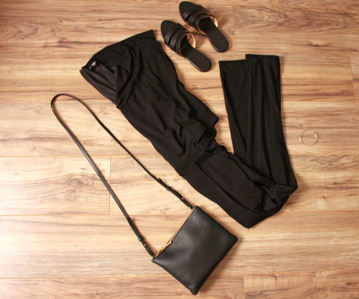 Nashville outfit Flatlay: black jumpsuit, black sandals, black purse