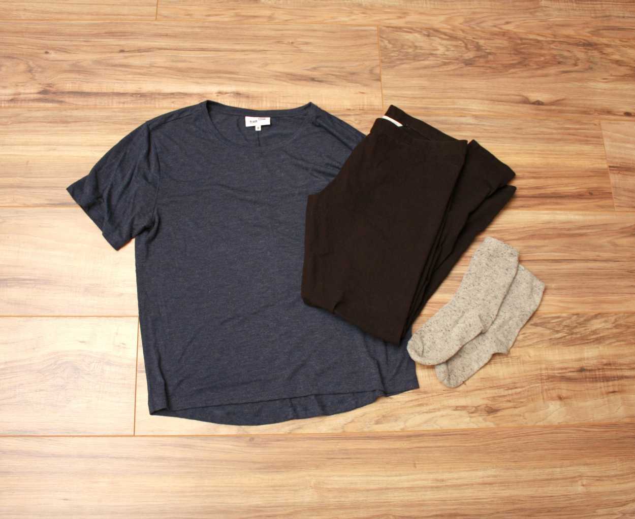 Nashville Flat lay: Blue tee, black leggings, grey socks