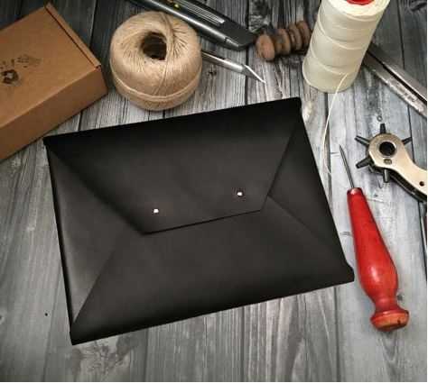 A black leather Laptop Sleeve