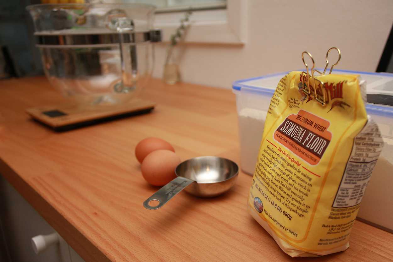  pasta carbonara ingredients: two eggs, AP flour, and semolina flour