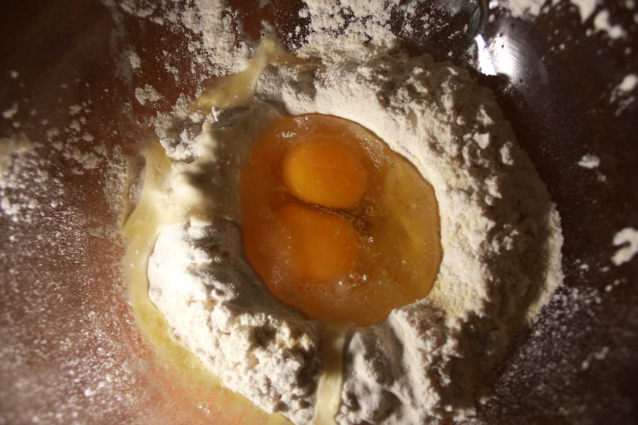 Eggs in a well of flour