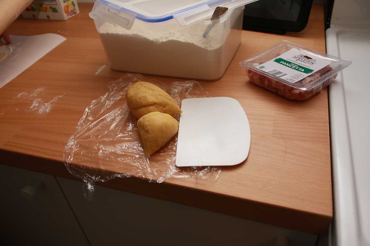 Cut pasta dough with a bench scraper