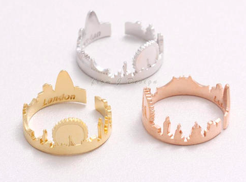 Three city skyline rings in different metals