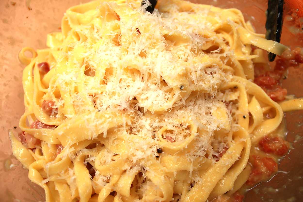 A bowl of finished pasta carbonara