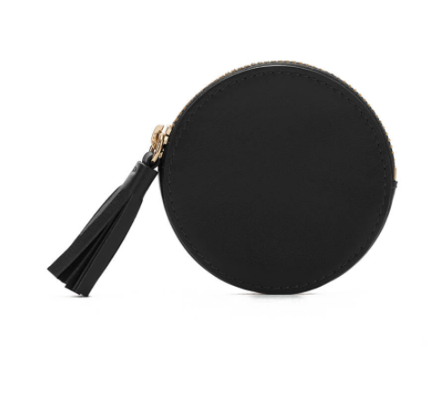 A black leather coin pouch from Cuyana