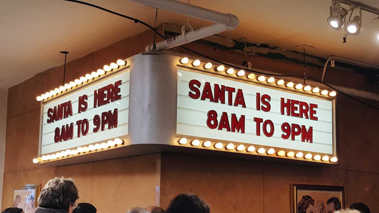 A crowd waits in line to see Santa at Macy's