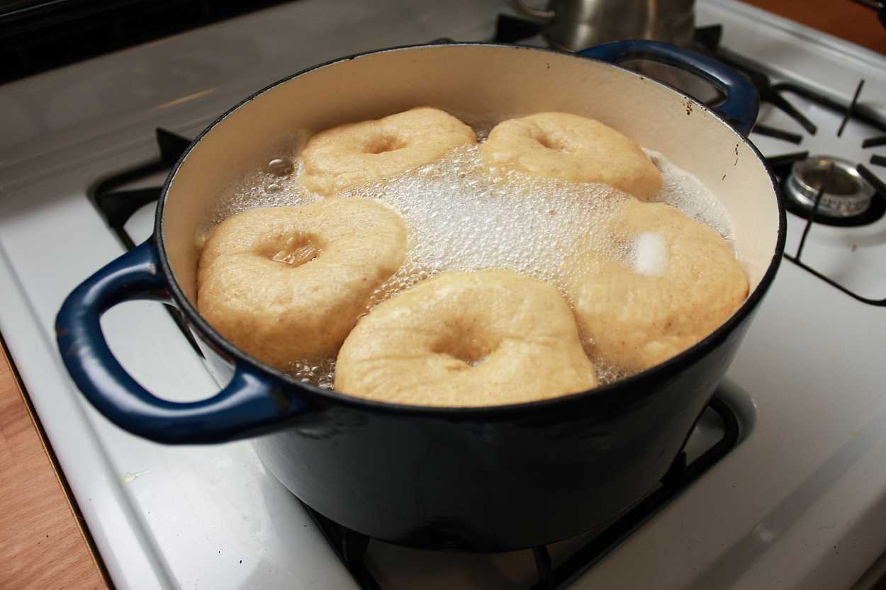 bagels boil in a dutch oven on the stovetop