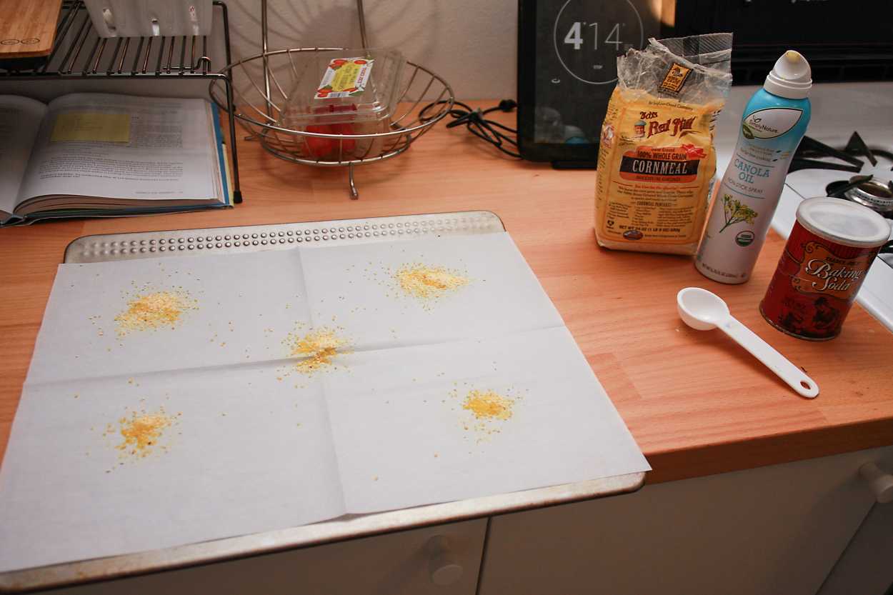 a sprinkling of cornmeal on a tray