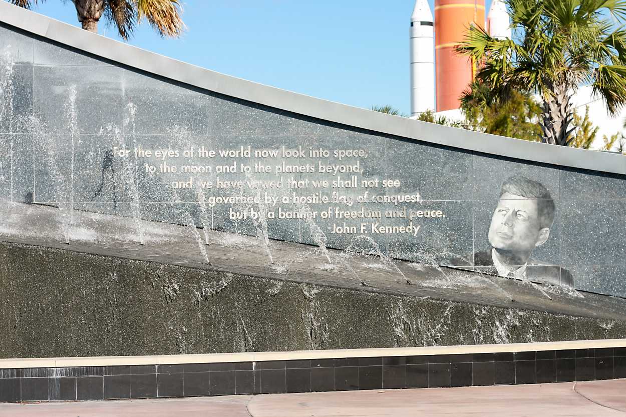 A quote from JFK embossed in a fountain at Kennedy Space Center