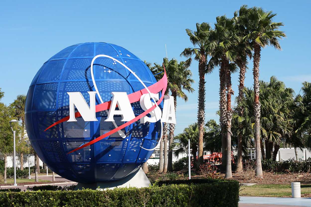 A large NASA globe at the entrance to Kennedy Space Center