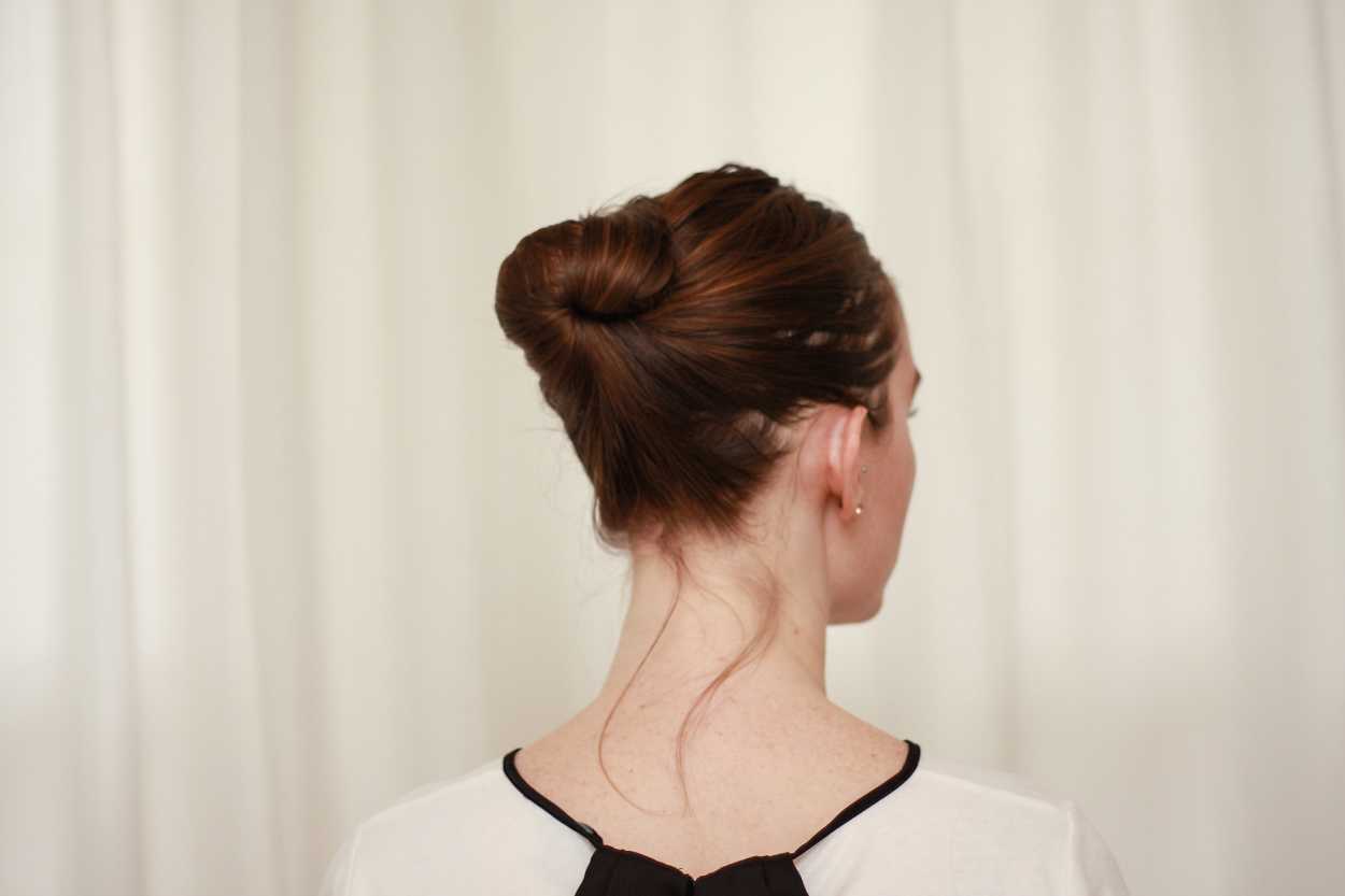 a woman wearing an updo