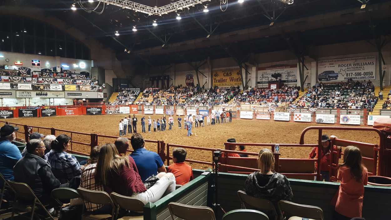 Kids line up for an activity at the Fort Worth Rodeo