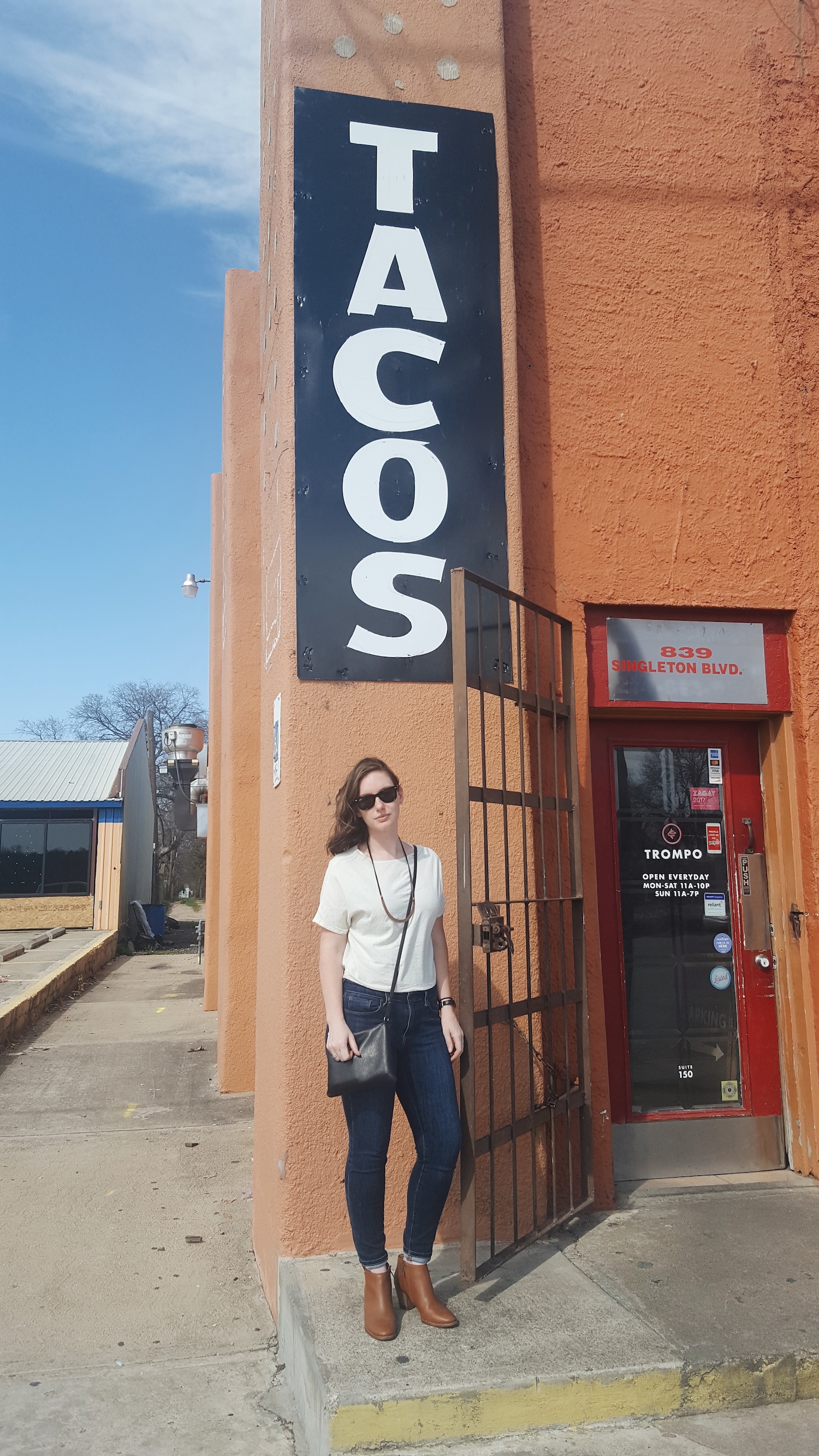 Alyssa stands outside of Trompo Tacos in Dallas