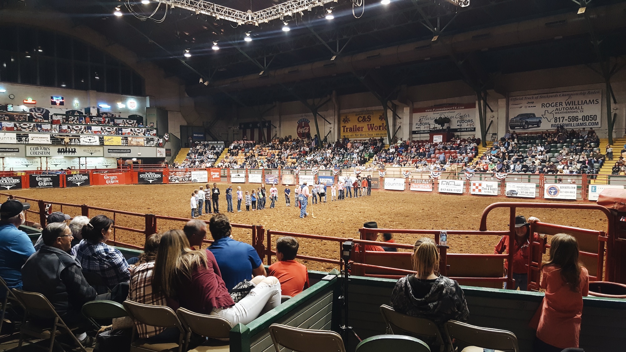 Kids line up for an activity at the Fort Worth Rodeo