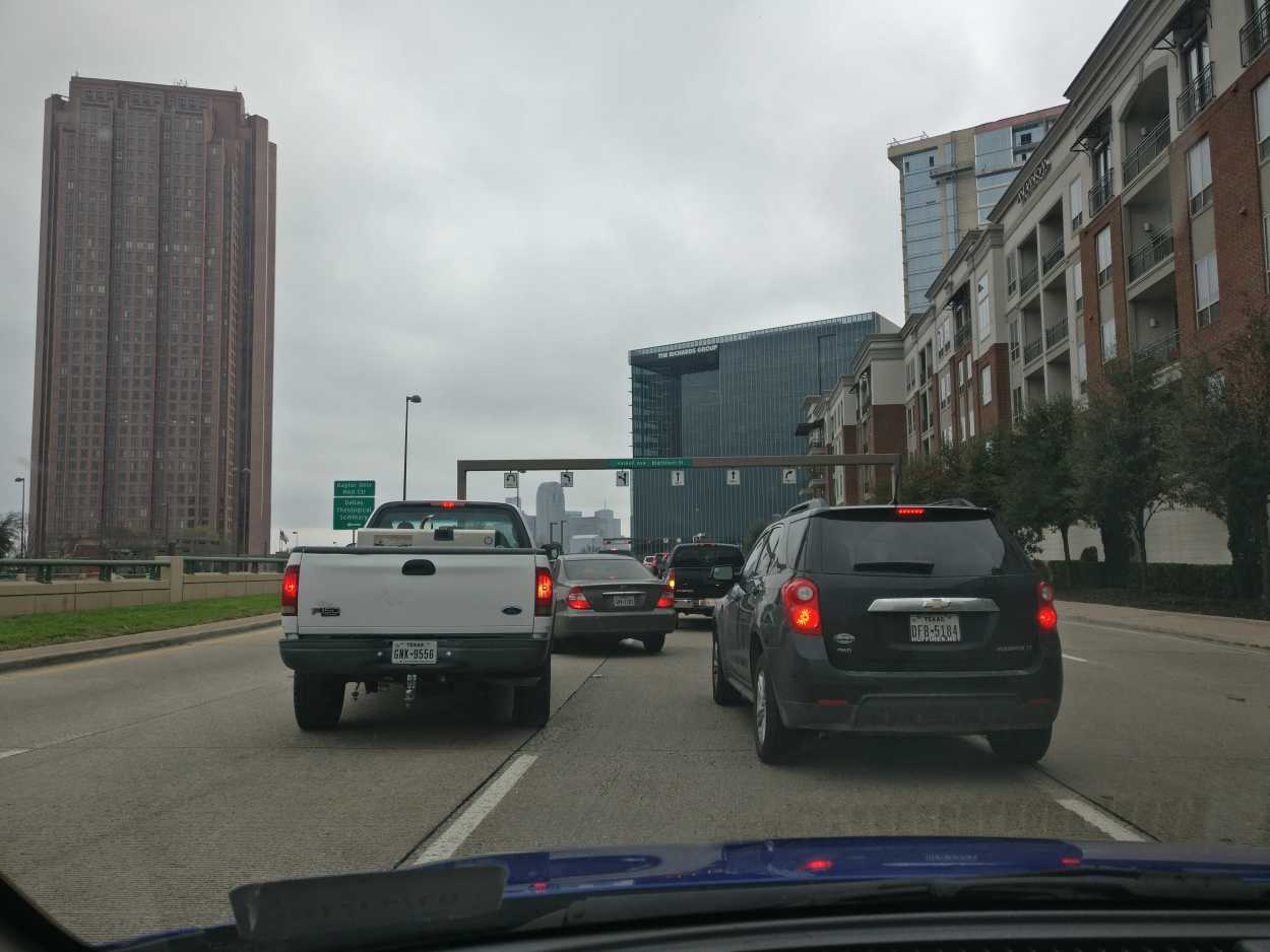 Cars merging into traffic in Dallas