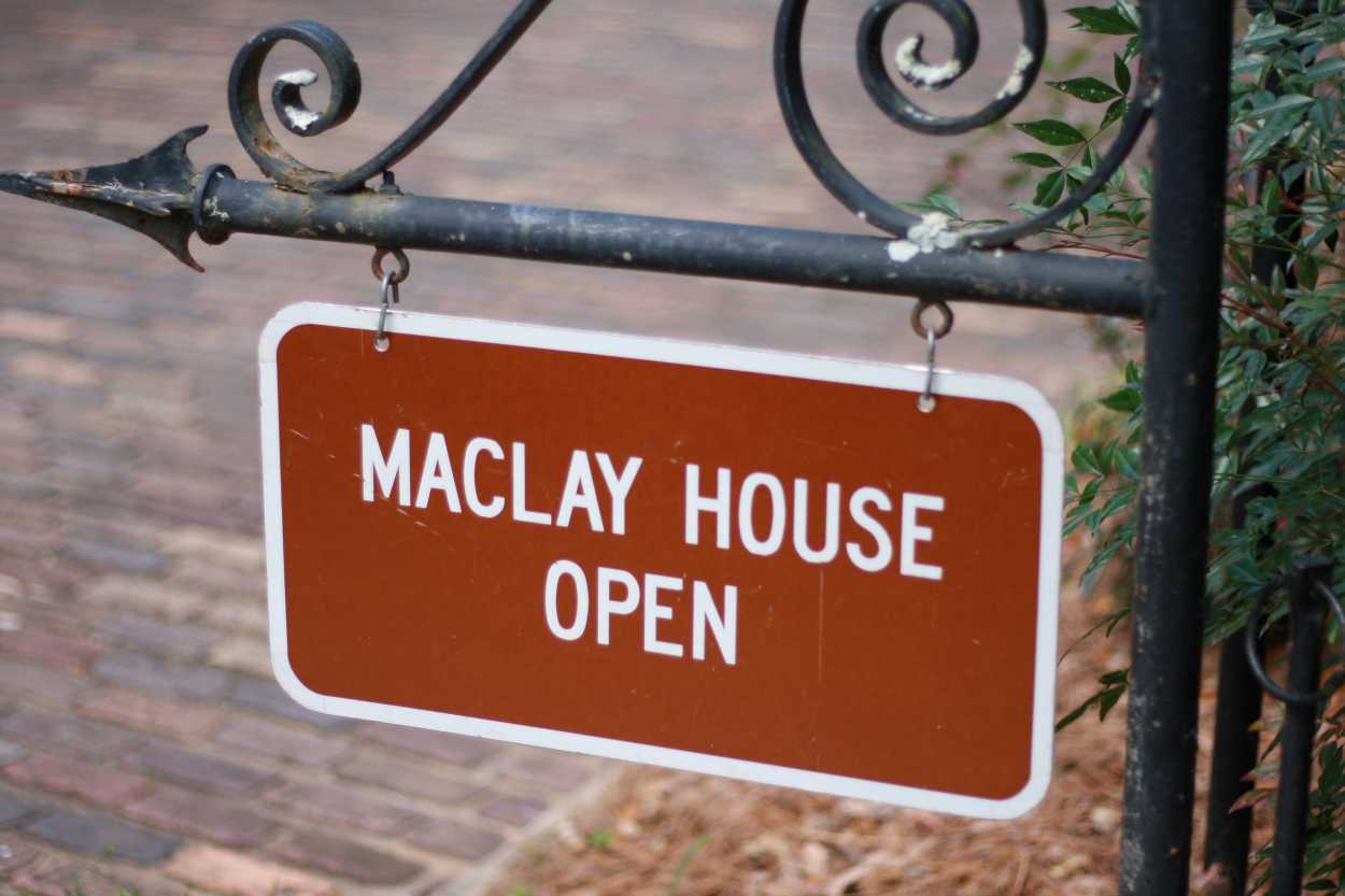 A sign that reads "Maclay House - Open"
