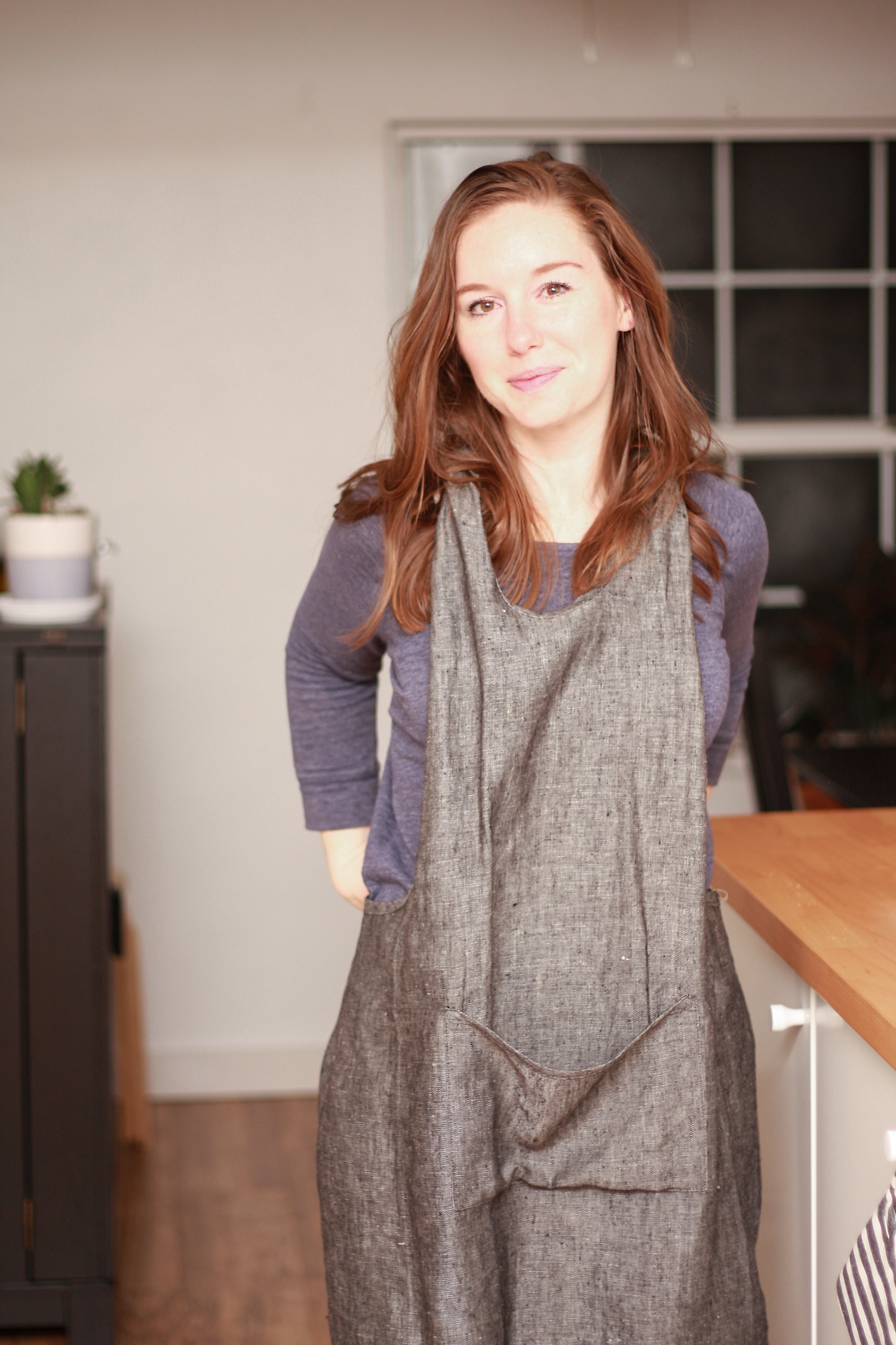 Alyssa wears an apron