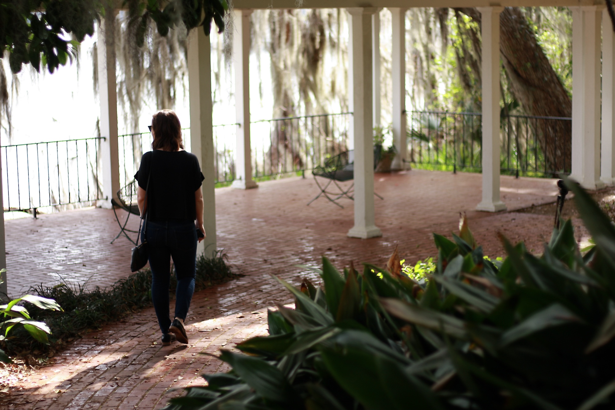Alyssa walks on a path at Maclay Gardens State Park