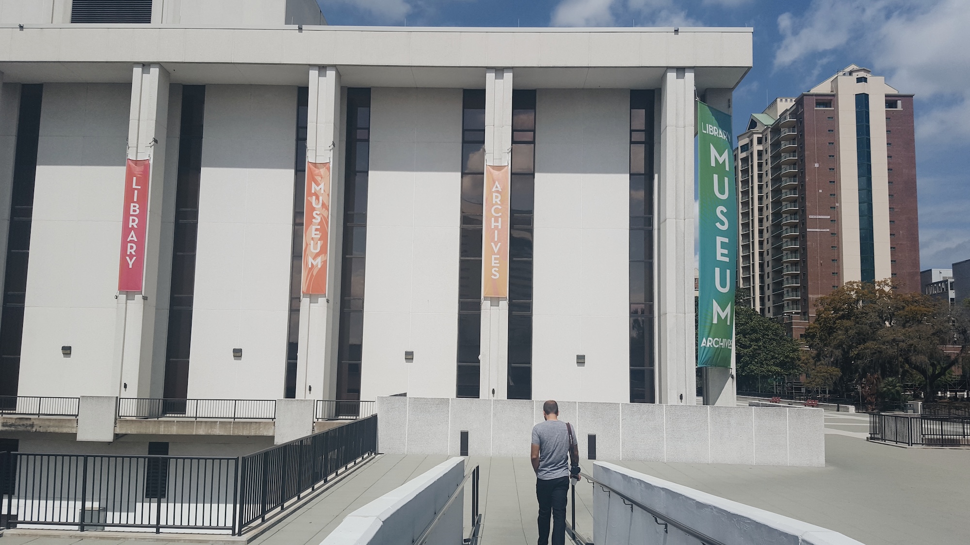Michael walks up to the Florida History Museum building
