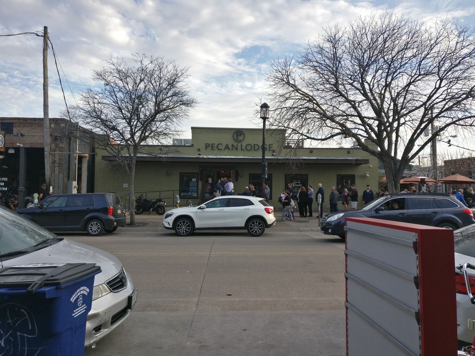 A line of people waiting for BBQ at Pecan Lodge