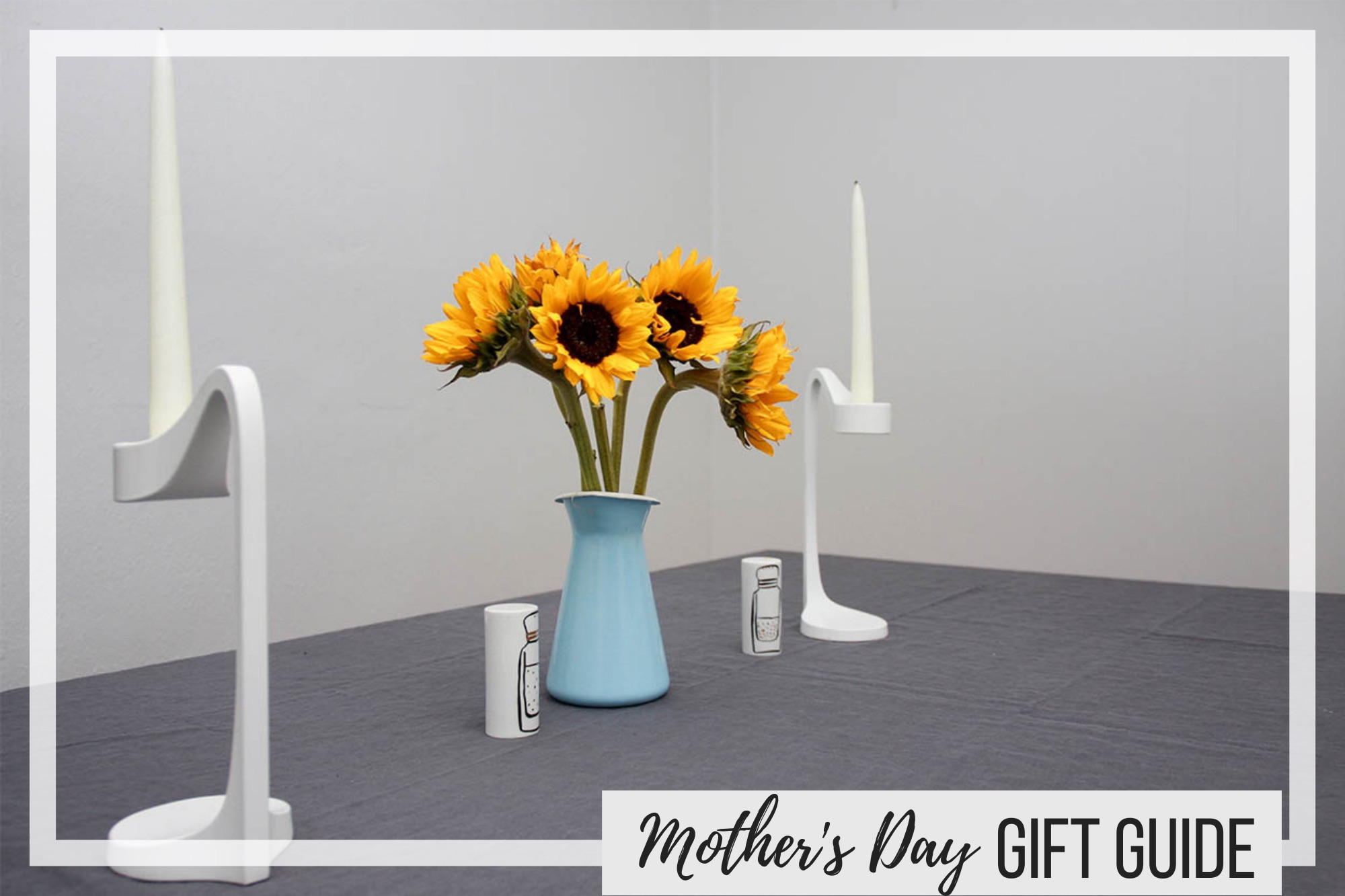 A vase with flowers and text overlay "Mother's Day Gift Guide"