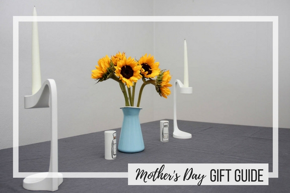 A vase with flowers and text overlay "Mother's Day Gift Guide"