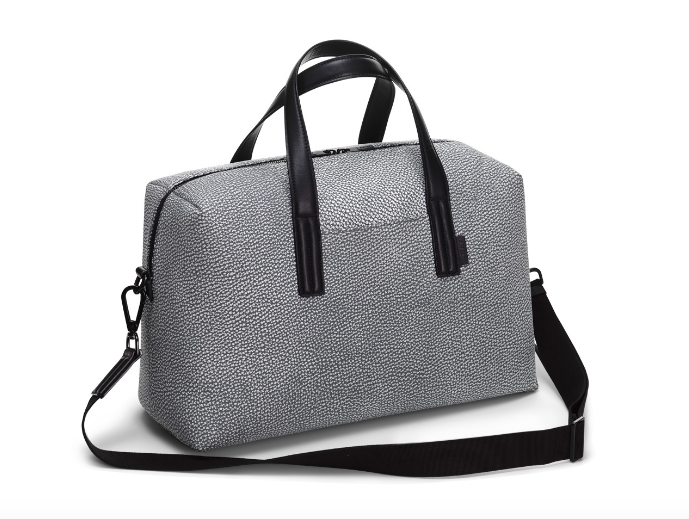 A black and white patterned bag from Away