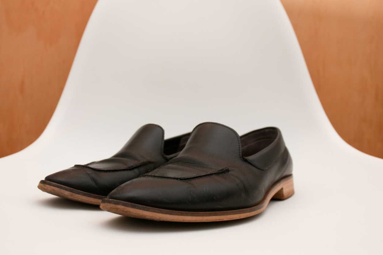 A pair of the Modern Loafers from Everlane sit on a chair