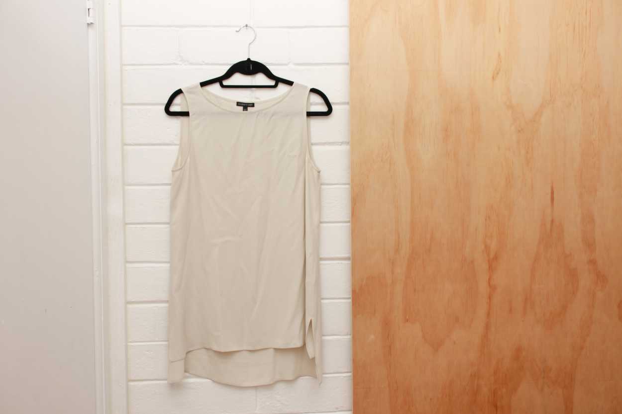 The Eileen Fisher System Silk Tunic hangs on a hanger
