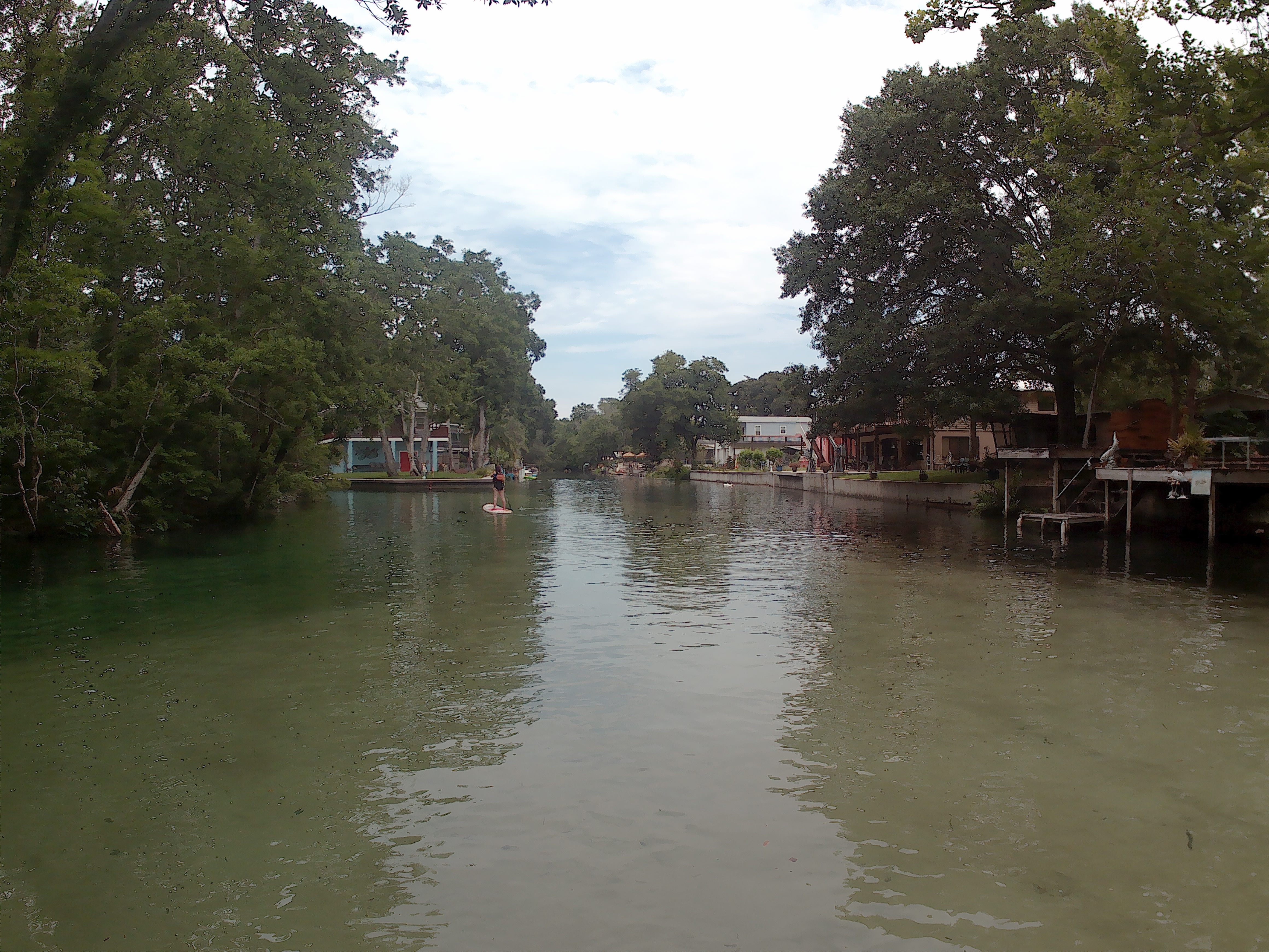 Alyssa is paddleboarding at Weeki Wachee