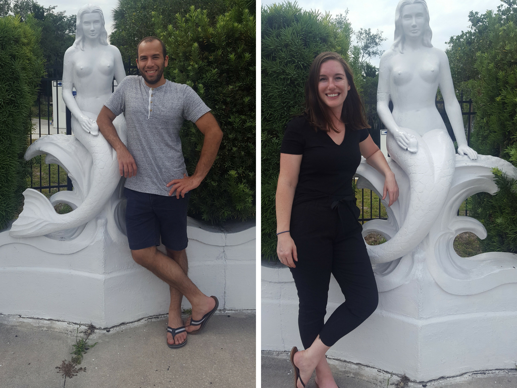 Alyssa and Michael take photos with a mermaid statue