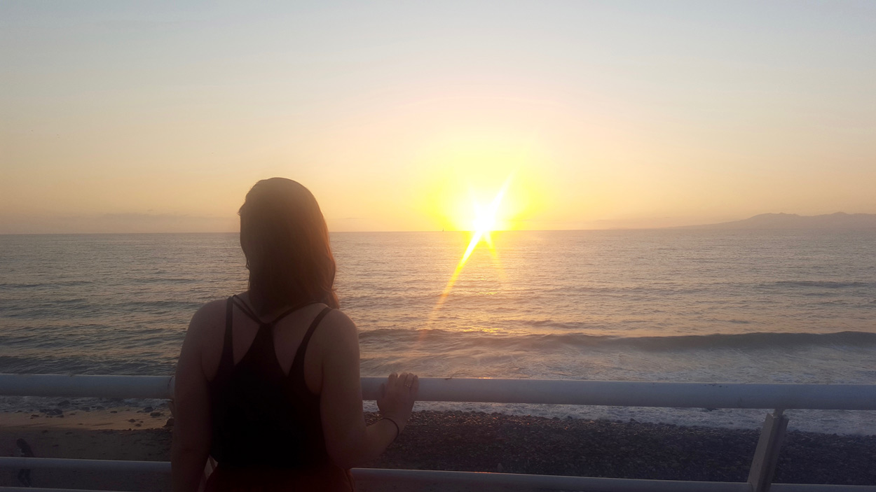 Alyssa watches the sun set in Puerto Vallarta 