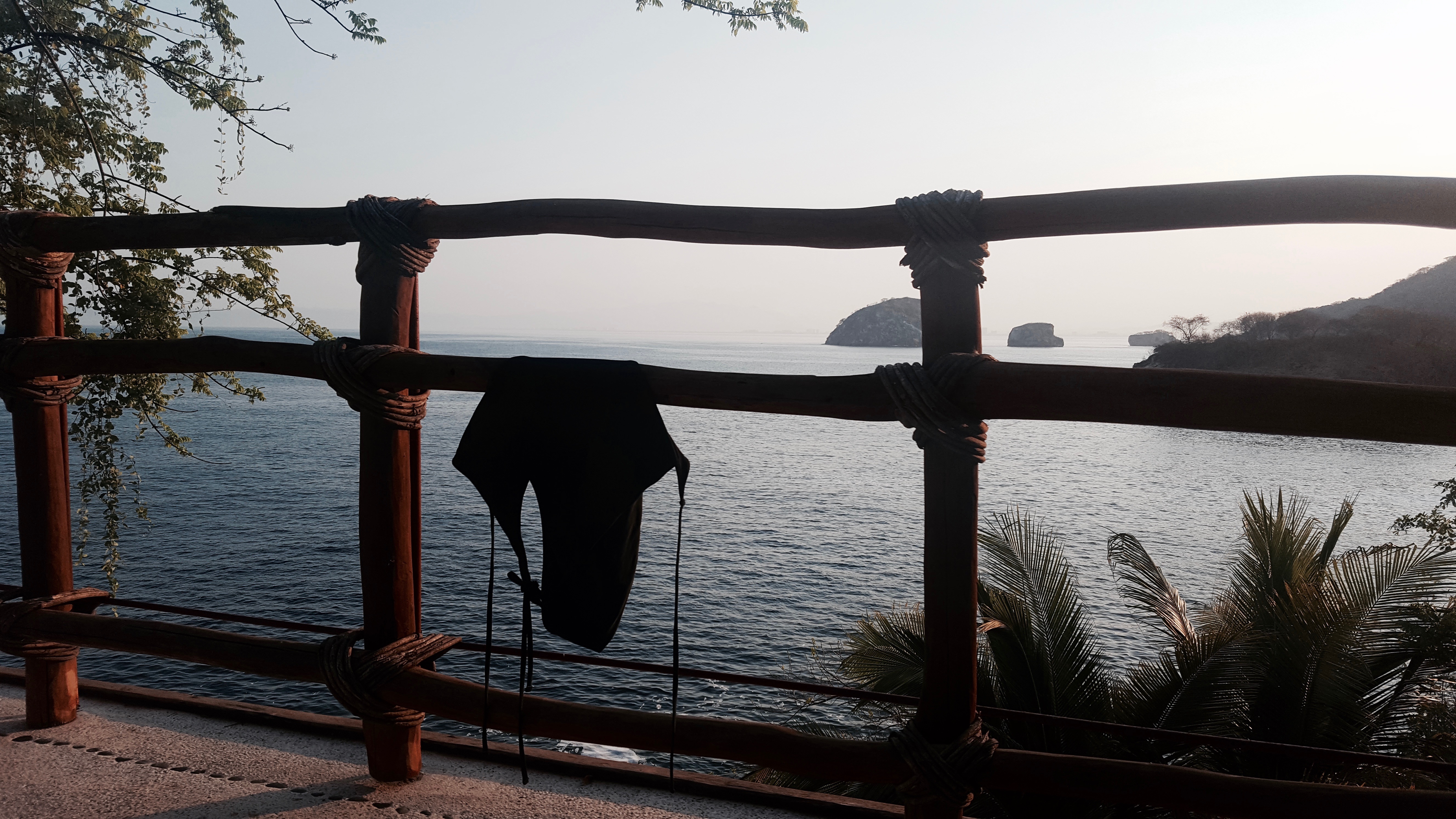 A swimsuit hangs on the balcony at Villa Mandarinas