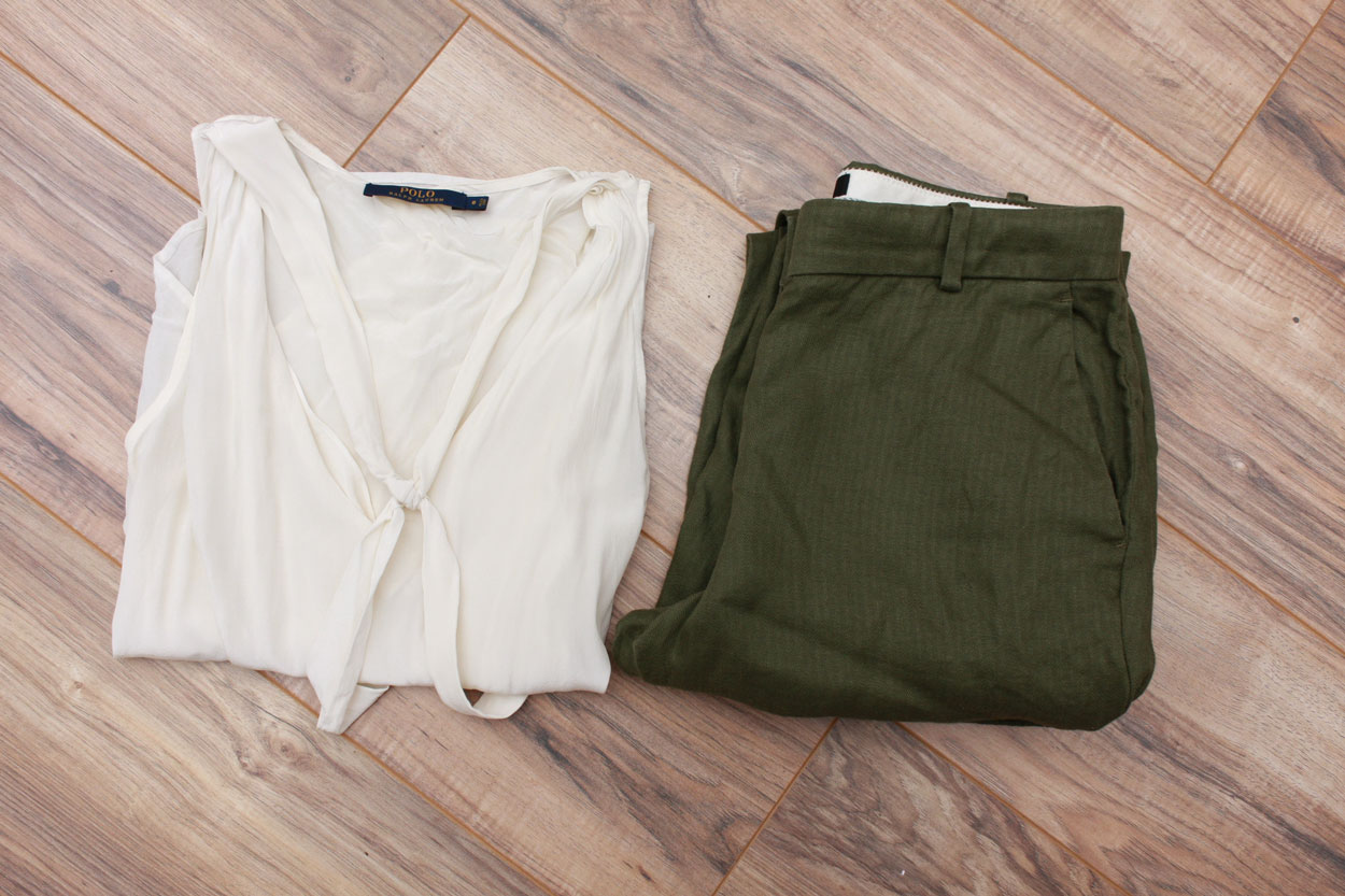 A white silk tank and olive pants