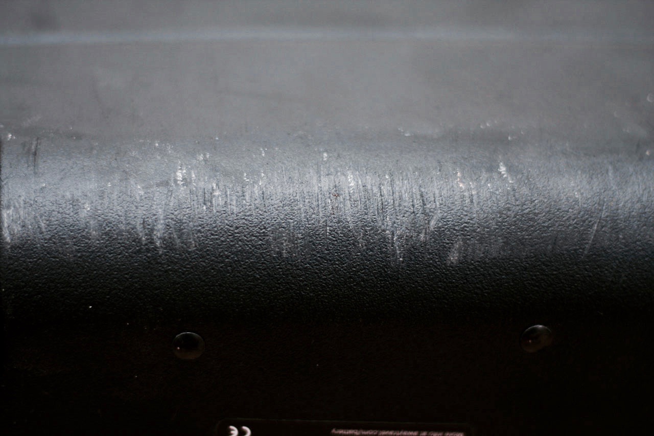 A close-up of the scuff marks underneath the Away Carry-On