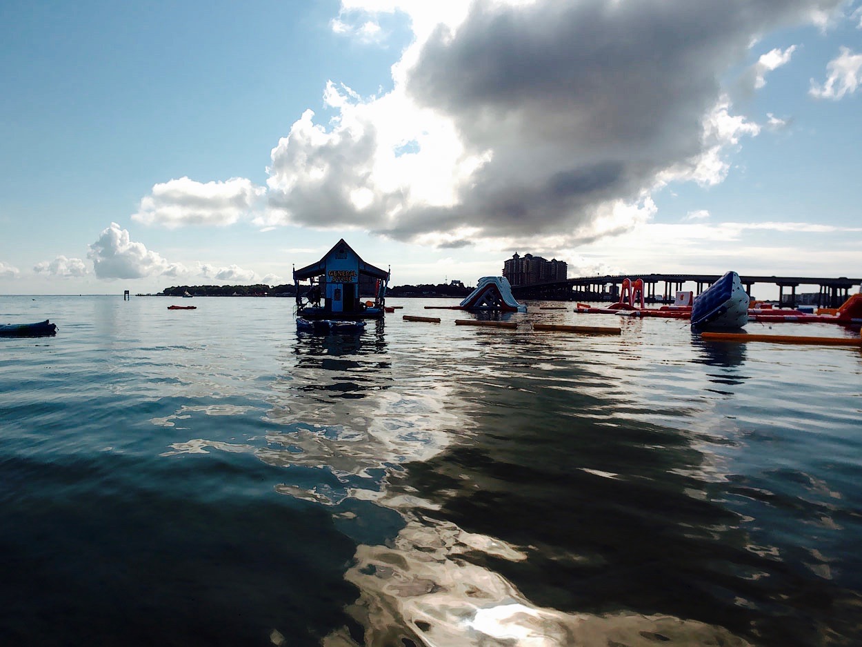 An inflatable obstacle course at Destin's famous Crab Island