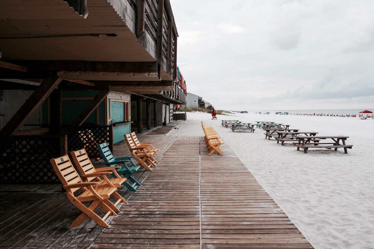 Chairs on the porch at Pompano Joes