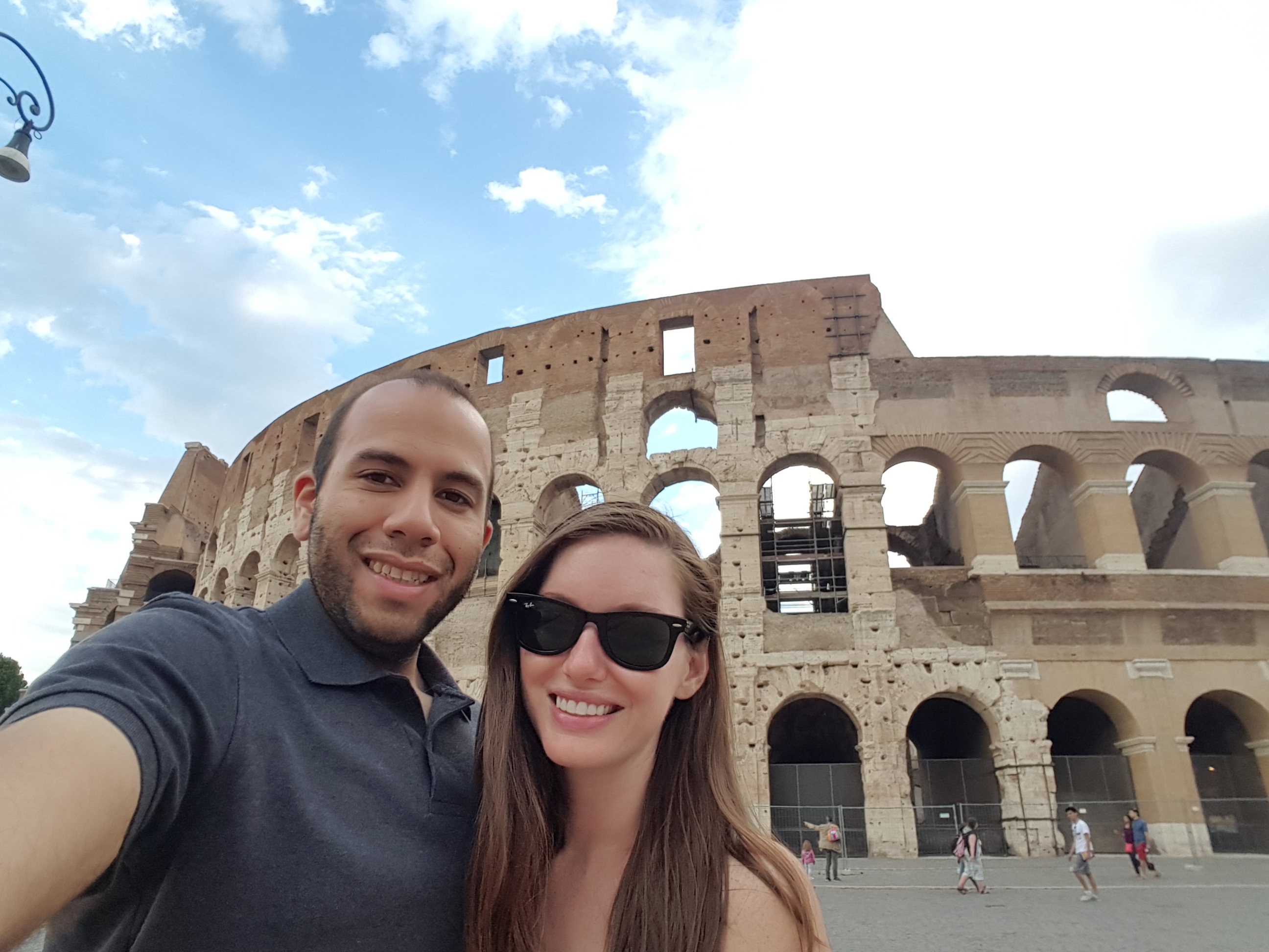 Alyssa and Michael in front of the Rome Colosseum