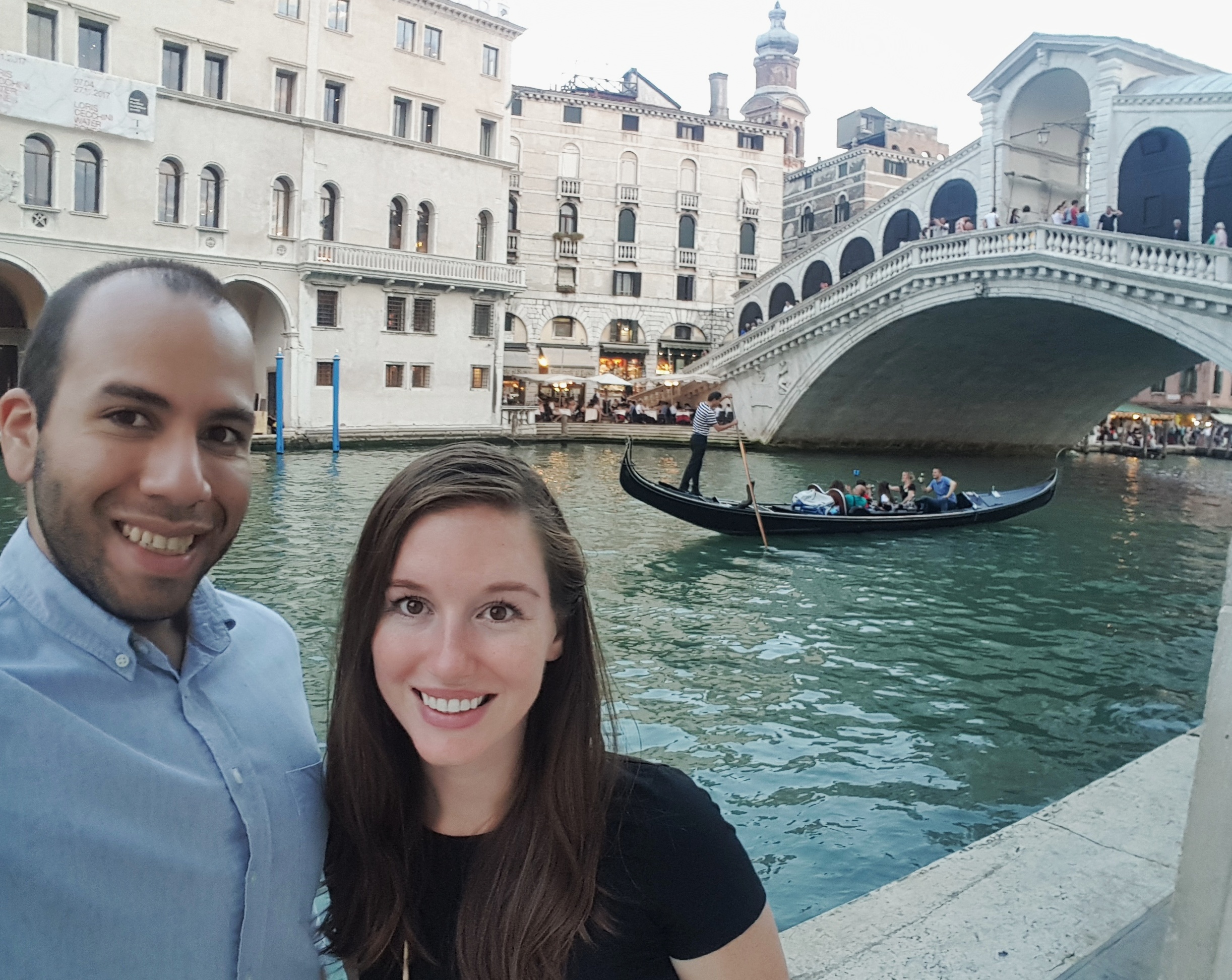 Alyssa and Michael in front of gondola in Venice, Italy