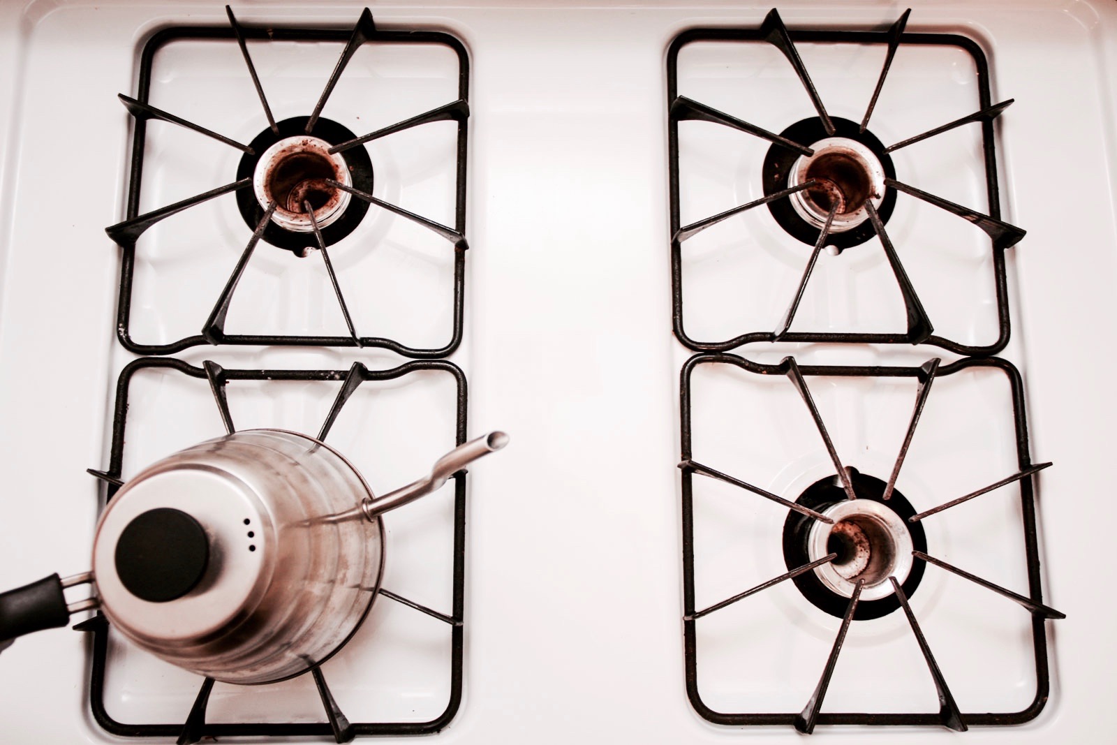 A kettle on a gas stove