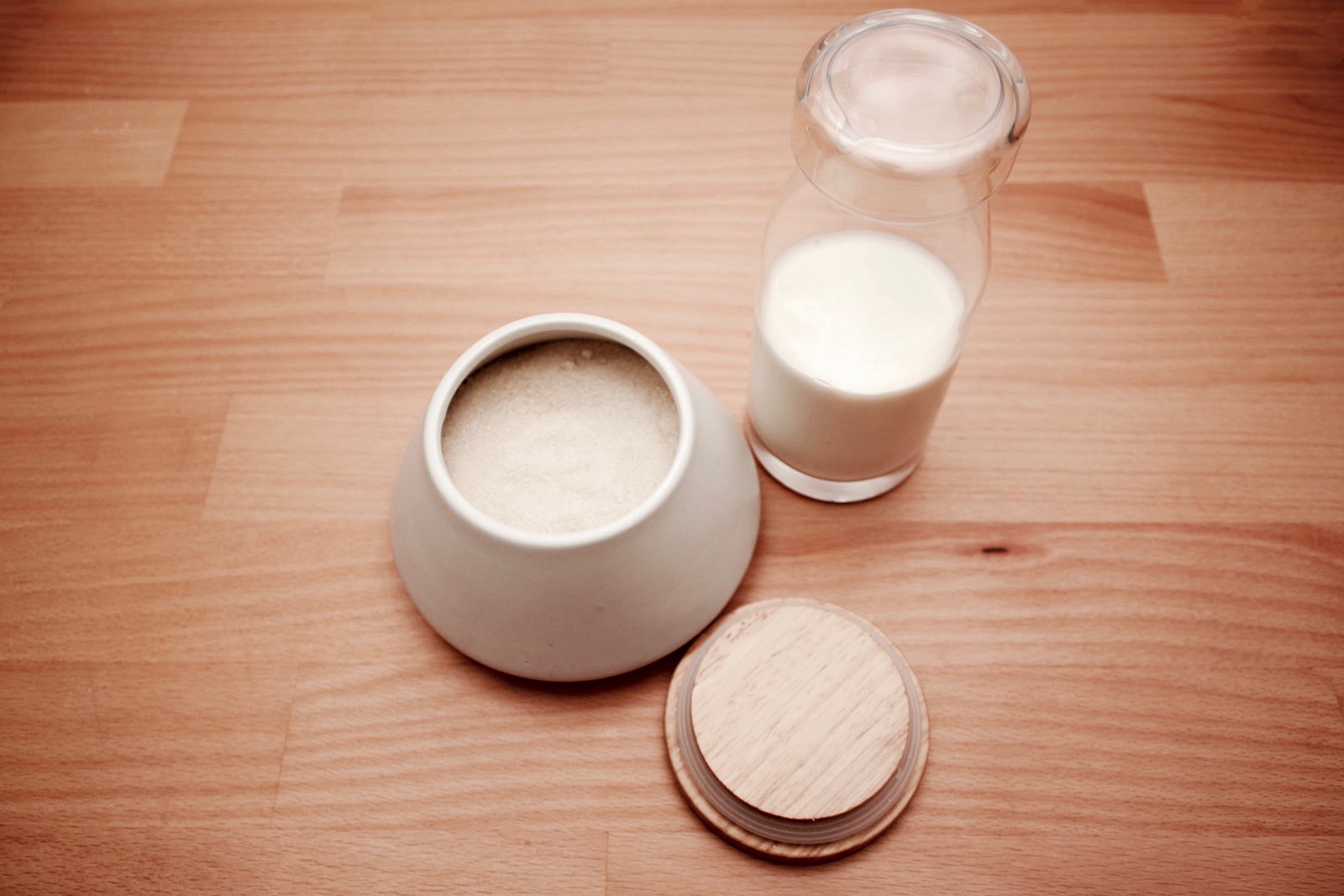 A sugar canister and creamer