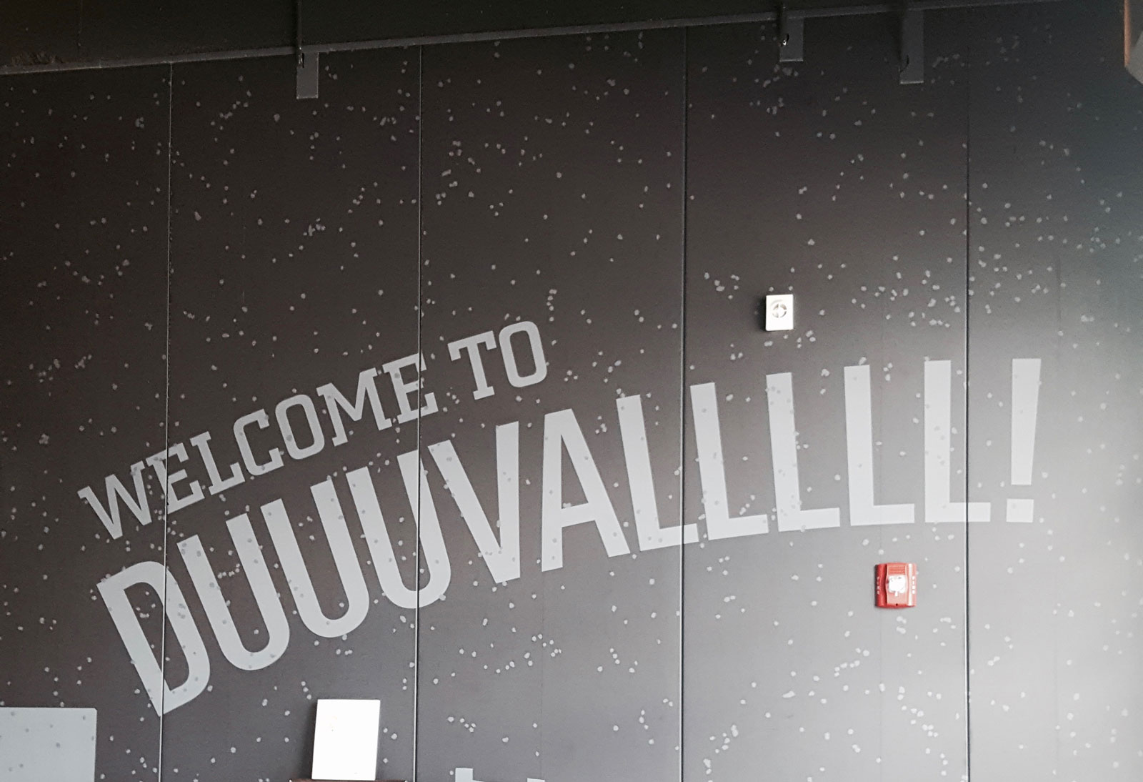 A mural that reads DUUUUUVALLL