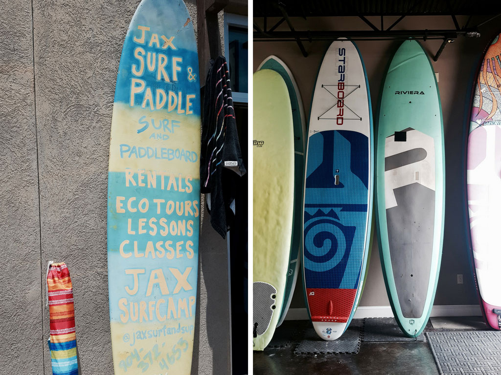 A wall of surf boards at Jax Surf + Paddle